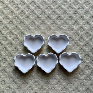 Crate & Barrel set of 5 white ceramic heart dishes